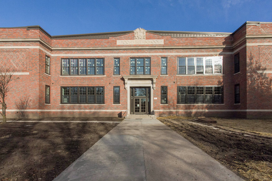 Scott and Karen's Efficient House 12 roosevelt school condos front Scott and Karen's Efficient House